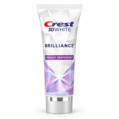 Crest 3D White Brilliance Vibrant Peppermint toothpaste tube standing on its cap on a white background