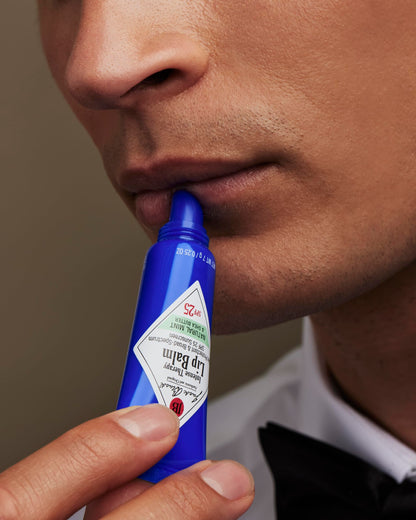 Jack Black Intense Therapy Lip Balm SPF 25 Shea Butter & Vitamin E - applying to lips