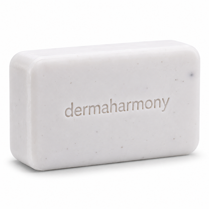 DermaHarmony Zinc + Shea Butter Soap - a bar of white soap with embossed logo